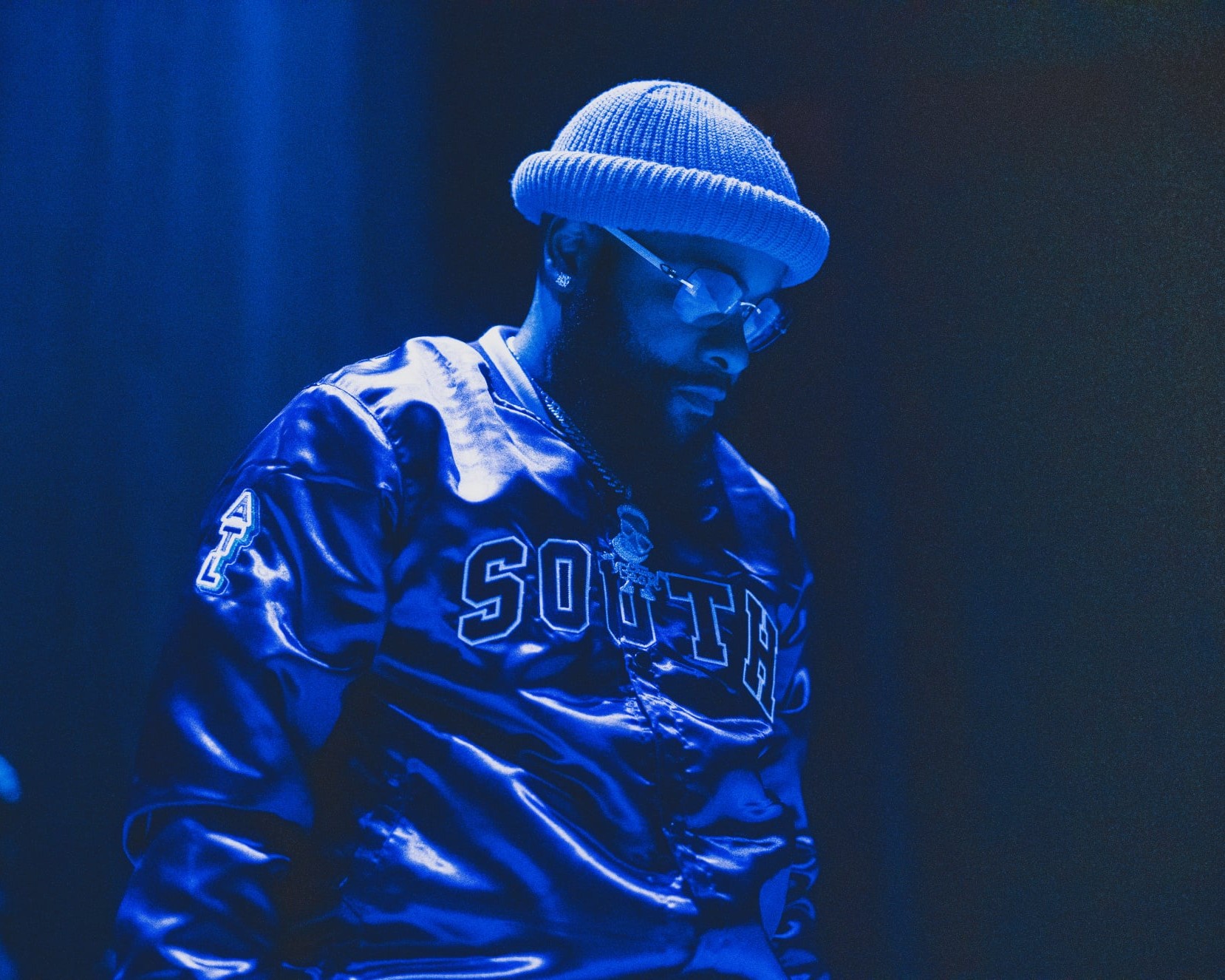 Earthquake performing on stage